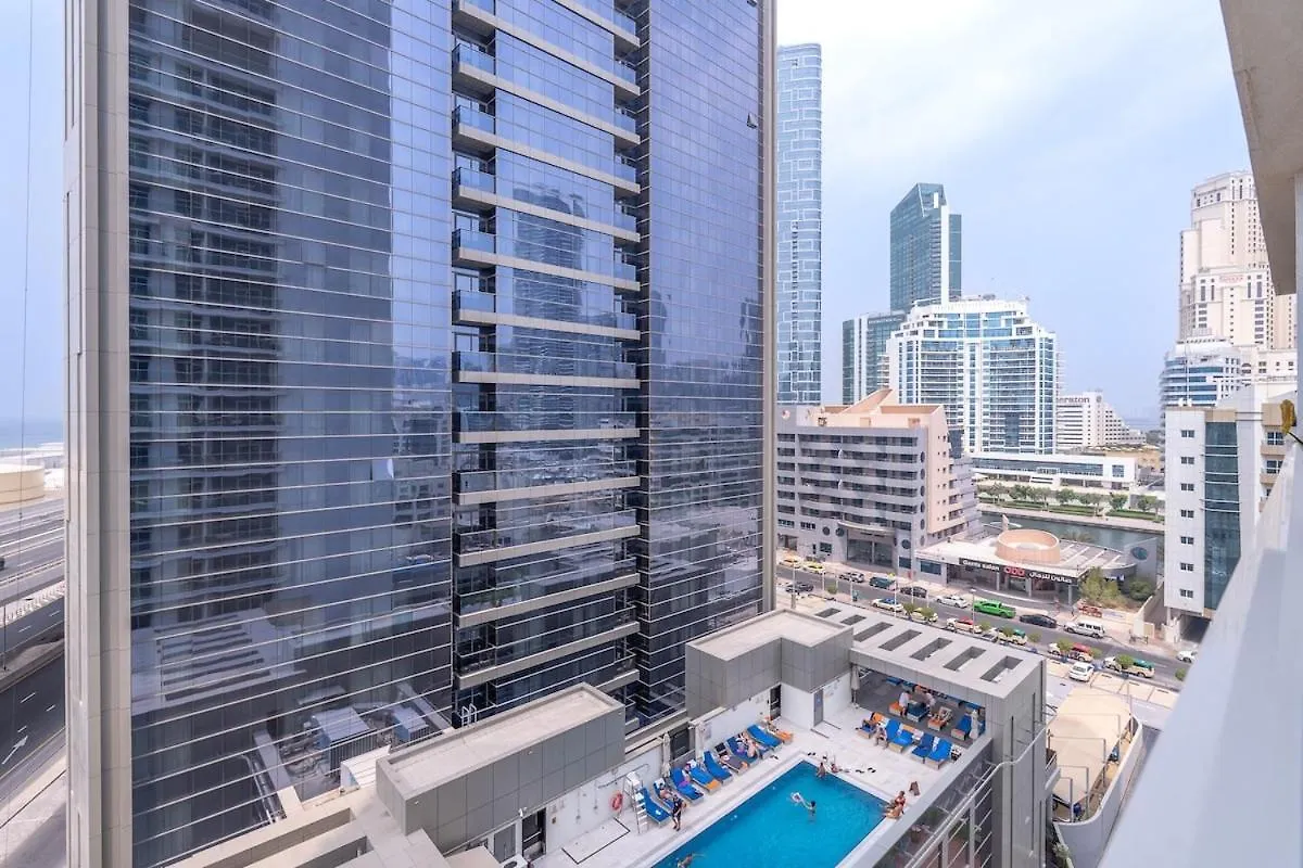 Glamorous 1Br Apartment - Steps From The Beach Dubai